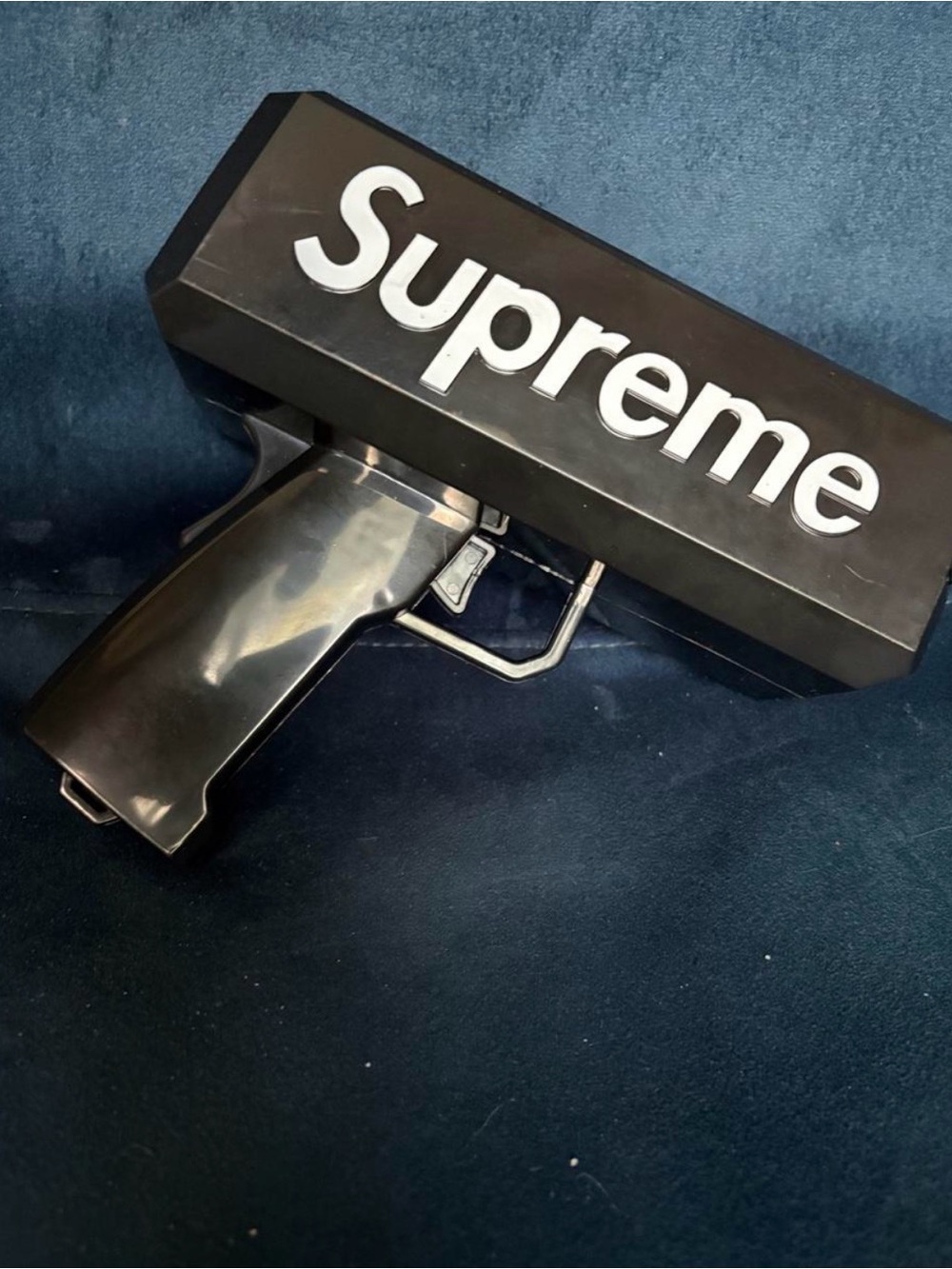 Supreme money gun